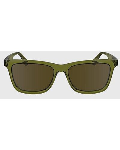 Calvin Klein Rechteckige Sonnenbrille CKJ24601S - Grün