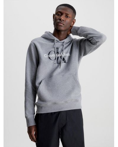 Calvin Klein Sweat à capuche avec monogramme - Gris