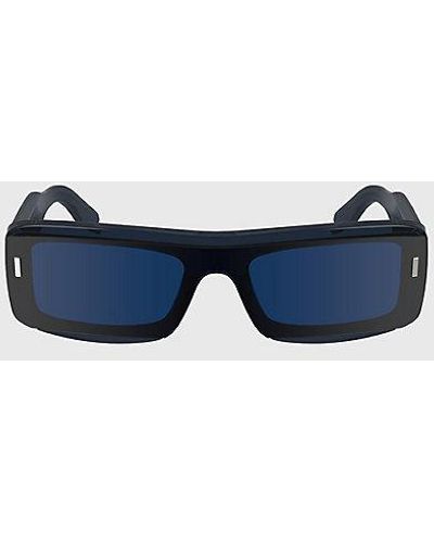 Calvin Klein Modifizierte rechteckige Sonnenbrille CK24503S - Blau