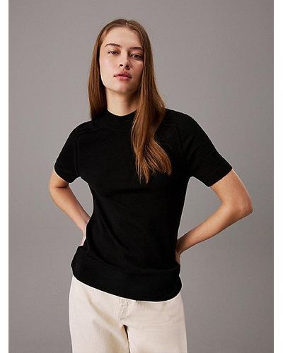 Calvin Klein Schmaler Pullover mit Stehkragen aus Merinowolle - Schwarz