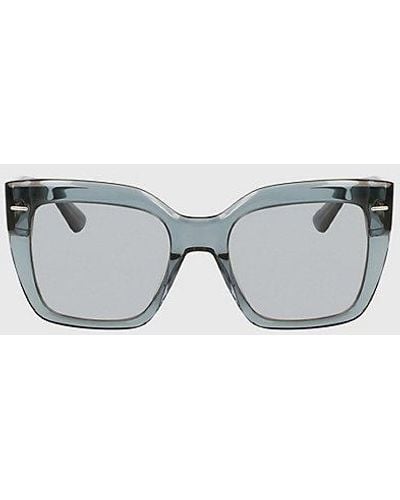 Calvin Klein Rechteckige Sonnenbrille CK23508S - Grau