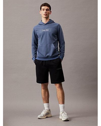 Calvin Klein Shorts deportivos de felpa francesa - Azul