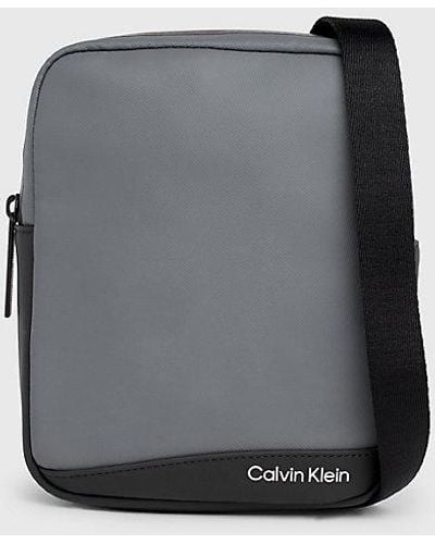 Calvin Klein Kleine wendbare Reporter-Bag - Grau