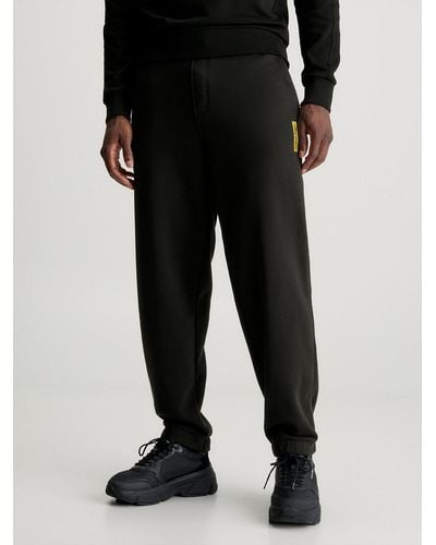 Calvin Klein Pantalon de jogging relaxed en coton et polaire - Noir