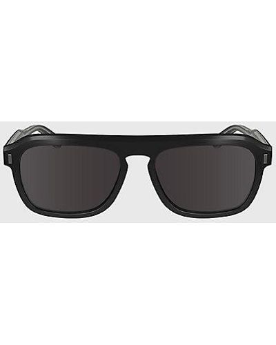 Calvin Klein Modifizierte rechteckige Sonnenbrille CK24504S - Schwarz