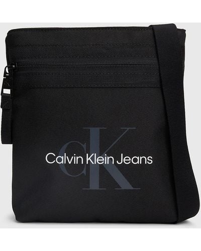 Calvin Klein Sac en bandoulière plat avec logo - Noir