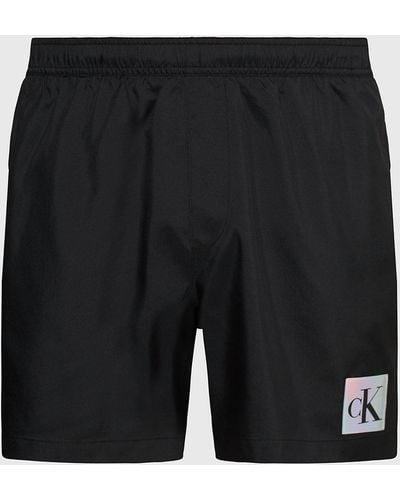 Calvin Klein Short de bain mi-long avec cordon de serrage - CK Festive - Noir