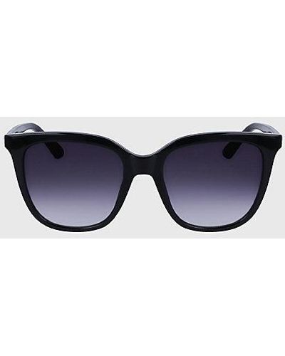 Calvin Klein Rechteckige Sonnenbrille CK23506S - Blau