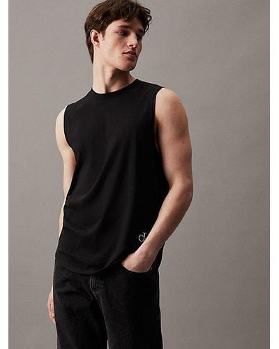 Calvin Klein Camiseta de tirantes de algodón con insignia - Negro