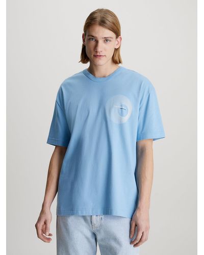 Calvin Klein T-shirt relaxed avec imprimé graphique et logo - Bleu