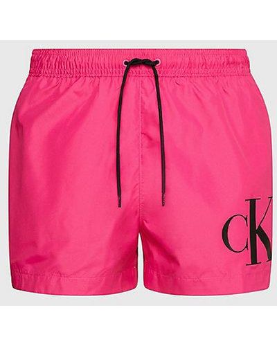 Calvin Klein Kurze Badeshorts mit Kordelzug - CK Monogram - Pink