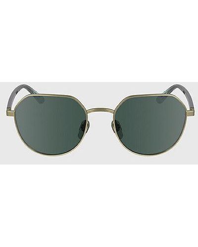 Calvin Klein Runde Sonnenbrille CK23125S - Grün