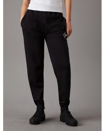 Calvin Klein Pantalon de jogging relaxed en polaire avec monogramme - Noir