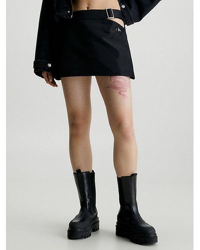 Calvin Klein Minifalda brillante con recorte - Negro