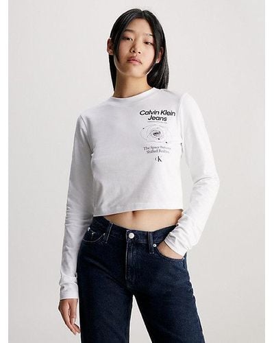 Calvin Klein Camiseta cropped de manga larga con logo - Blanco