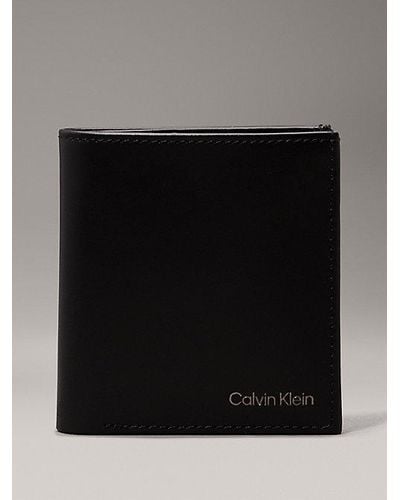 Calvin Klein Cartera de piel de plegado triple con RFID - Negro