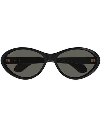 Gucci black oval clearance sunglasses
