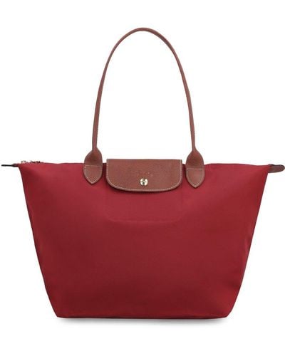 Shop Longchamp Plain Leather Logo Shoulder Bags (10218968001) by  LaBoutiqueR