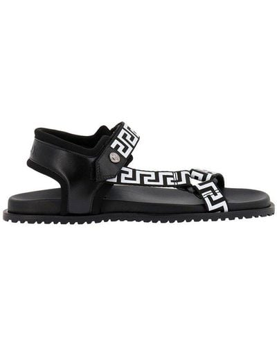 Versace Logo Embossed Flat Sandals - Black