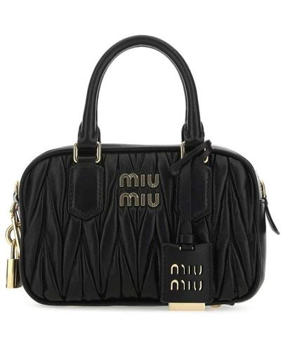 Miu Miu Logo Plaque Matelassé Top Handle Bag - Black