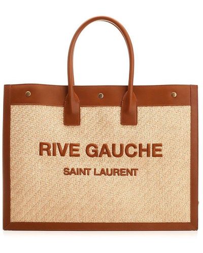 Sold at Auction: A Saint Laurent (YSL) Large Black Rive Gauche Tote Bag.