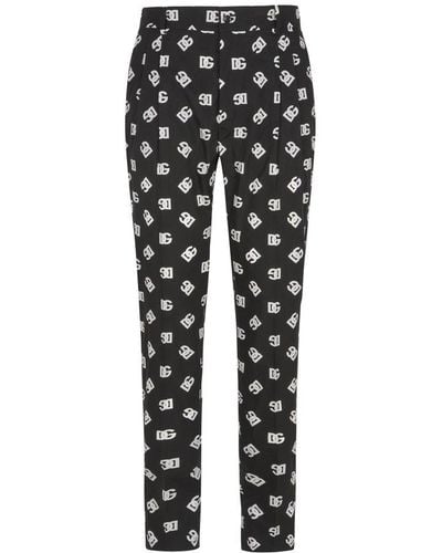 Dolce & Gabbana All-over Logo Printed Trousers - Black