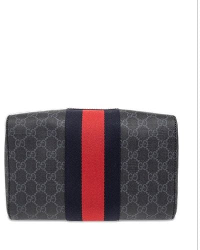 Gucci monogram-embossed wash bag