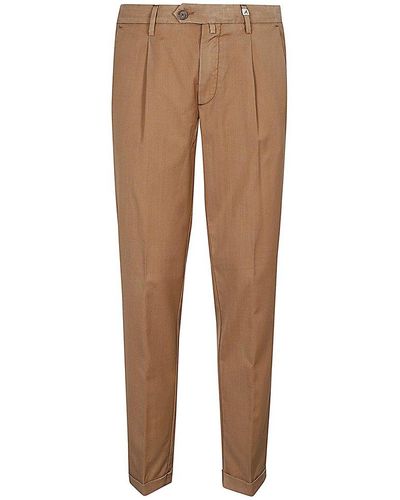 Myths Tailored Tapered Pleat-detailed Trousers - Natural