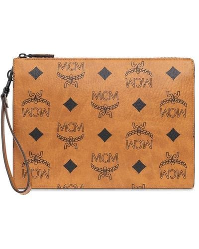 MCM Visetos Monogrammed Clutch Bag - Brown