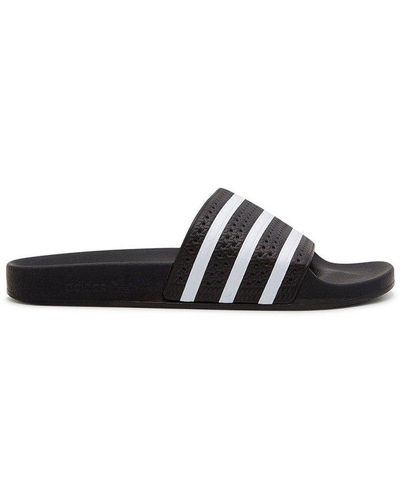 stun emne materiale Adidas Adilette Sandals for Men - Up to 70% off | Lyst