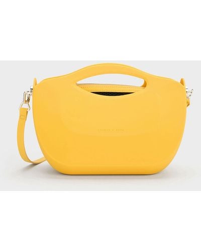 Charles & Keith Cocoon Curved Handle Bag - Yellow