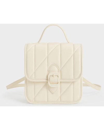 Charles & Keith Lin Quilted Belted Backpack - Natural