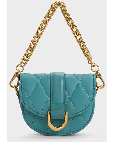 Charles & Keith Micro Gabine Quilted Saddle Bag - Blue