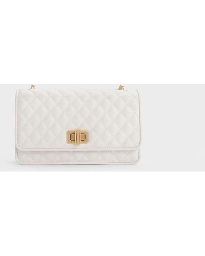 Charles & Keith Metallic Turn-lock Quilted Clutch - White