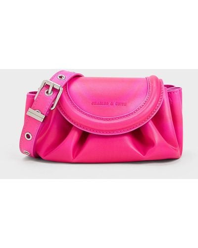 Charles & Keith Mini Blossom Curved Flap Crossbody Bag - Pink