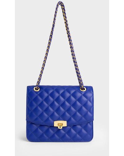 Charles & Keith Quilted Chain Strap Clutch - Blue