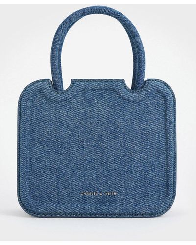Charles & Keith Perline Denim Sculptural Top Handle Bag - Blue