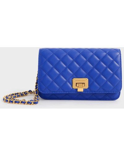 Charles & Keith Quilted Push-lock Clutch - Blue