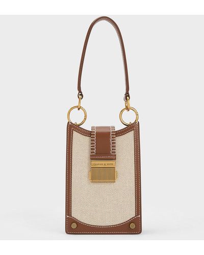Charles & Keith STRUCTURED TRAPEZE BAG (5.015 RUB) ❤ liked on