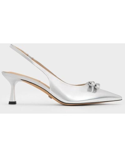 Charles & Keith Bow Crystal-embellished Metallic Leather Slingback Pumps - White