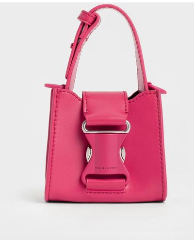 PRE ORDER Charles & Keith Twist Top Handle Front Flap Bag -  shoppelayer21.official