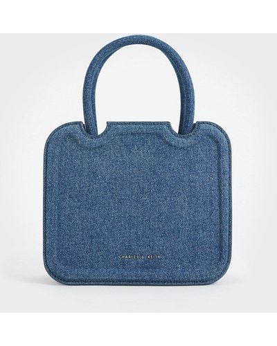 Charles & Keith Perline Denim Sculptural Top Handle Bag - Blue
