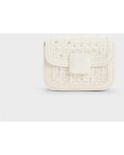 Charles & Keith Oona Canvas Curved Shoulder Bag in White