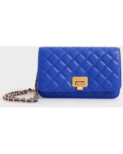 Charles & Keith Quilted Push-lock Clutch - Blue