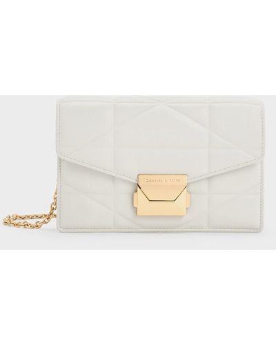 Charles & Keith Oona Canvas Curved Shoulder Bag in White