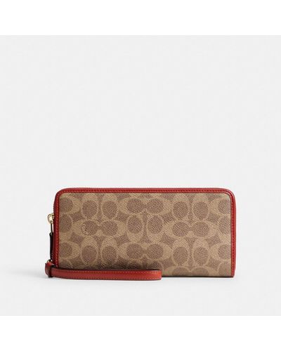 COACH Essential Continental Wallet In Signature Canvas - Brown