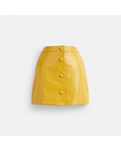 COACH Patent Leather Mini Skirt - Yellow