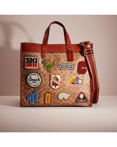 COACH Restored Field Tote 40 In Signature Canvas With Patches - Brown