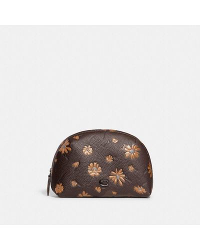 Women's COACH Makeup bags and cosmetic cases from $65 | Lyst