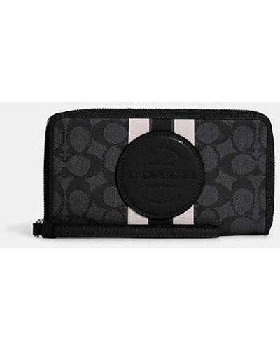 COACH Dempsey Large Phone Wallet In Signature Jacquard With Stripe And Coach Patch - Black